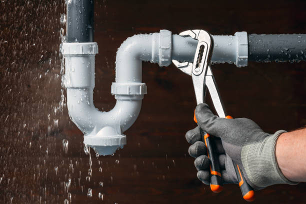 Professional Drain Cleaning technician working in Wellsville, OH
